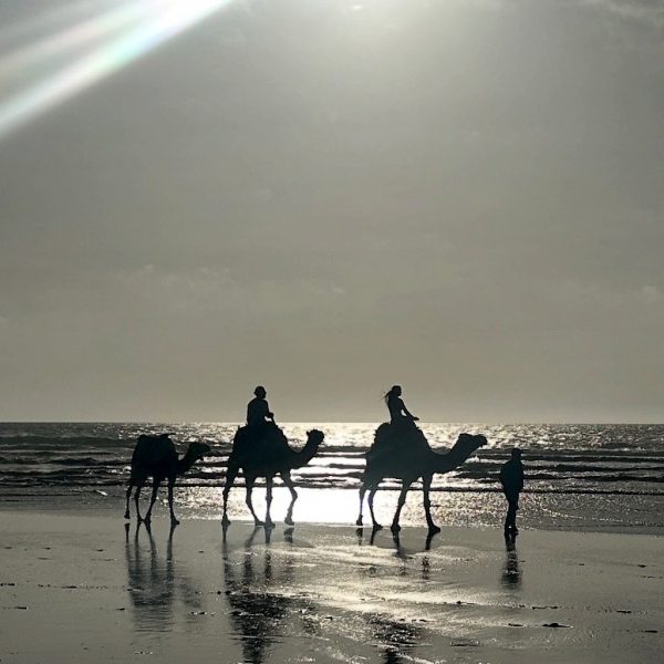 Camel-Riding-Sidi-Kaouki a couple riding a camle on the beach of Sidi Kaouki