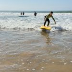 Little-Girl-takes-suf-lessons-with-Momo-Sidi-Kaouki