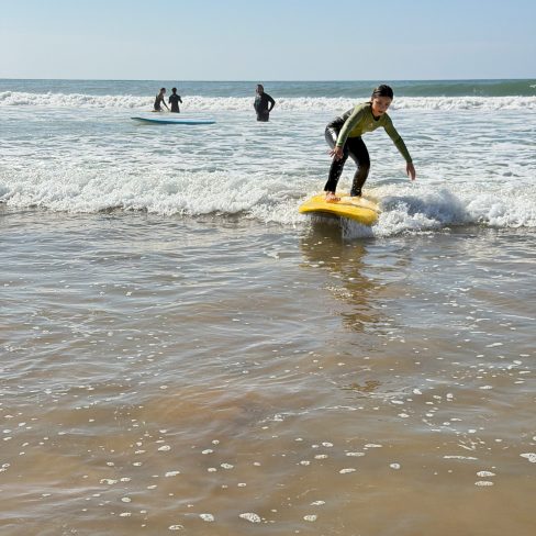 Little-Girl-takes-suf-lessons-with-Momo-Sidi-Kaouki